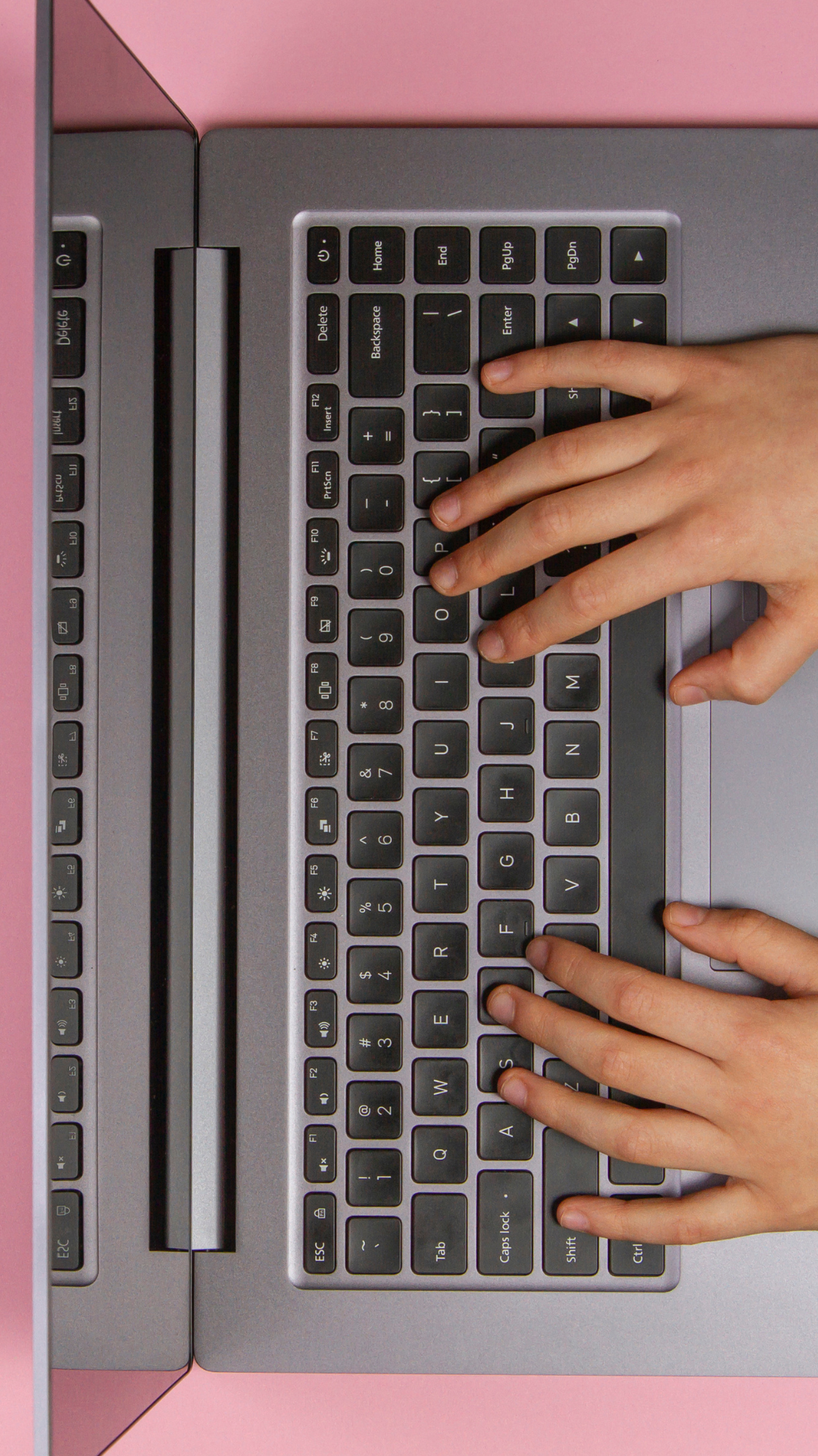 Hands at a computer